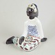 Mari Simmulson for Upsala-Ekeby, woman figurine.Hand-painted faience figurine depicting a ...