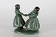 Ipsens EnkeFigurine of two girls in folk costume dancing ceramic with jade green glaze no. ...