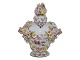 Porcelain from Germany, small lidded bottle with many flowers.Height 8 cm.On some ...