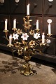 Old French church candlestick in bronze, decorated with bronze lilies and 3 old white opaline glass lilies...