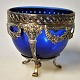 Silver sugar bowl with blue glass insert, 19th century.