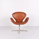 The Swan model 3320 by Arne Jacobsen for Fritz Hansen in original cognac leather from the 1960s. ...