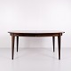 Omann Jun Model 55 dining table by Gunni Omann in rosewood with extension leaves from the 1960s. ...
