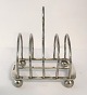 Elkington. English toast holder in sterling silver (925). Length 12 cm. Height 13.5 cm. Produced ...