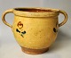 Two-handled jar with yellow exterior glaze, Sorring, ca. 1870, Denmark. Decorated with flowers. ...