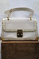 Louis Vuitton vintage bag, Suhali Le Talentueux from 2006 in white leather with gold rivets...