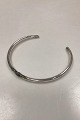 Modern Open Neckring in unmarked silverOpening measures: 70 mm / 1.76 inchInner diameter: ...
