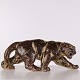 Stoneware figure depicting a panther, model 20283, designed by Knud Kyhn for Royal Copenhagen. ...