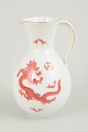 Jug with Ming dragon, Meissen area.Baluster-shaped jug in white-glazed porcelain decorated ...