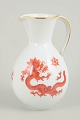 Jug with Ming dragon, Meissen area.Baluster-shaped jug in white-glazed porcelain decorated ...