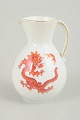 Jug with Ming dragon, Meissen area.Baluster-shaped jug in white-glazed porcelain decorated ...