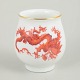 Small vase with Ming dragon, Meissen area.Small baluster-shaped vase in white-glazed porcelain ...