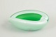 Murano glass bowl.Low bowl in hand-blown opaline and green glass with an organic, asymmetrical ...