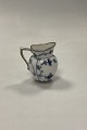 Royal Copenhagen Blue Fluted Plain with Gold Creamer No 59. Measures 9.5 cm / 3 47/64 in.