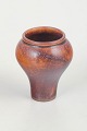 Miniature vase, Arabia, Finland.Small hand-thrown miniature stoneware vase with a warm brown ...