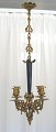 French bronze chandelier with four candle arms and pipes with cuffs, 19th century. Arms with ...