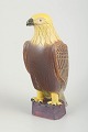 Ego Stengods, falcon figure.Naturalistically modelled falcon in glazed stoneware with a brown ...