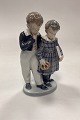Royal Copenhagen Figurine - The flight to America No. 1761. Designed by Christian Thomsen. 2nd ...