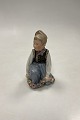 Royal Copenhagen overglaze figurine Amager Boy No. 12414. Measures 15cm (5 29/32 in.) Has small ...