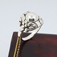 Georg Jensen; Ring of sterling silver set with a silver stone.  Design no. 11B. From the ...