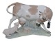 Lladro (Spain) figurineCow with small pig