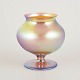 Loetz iridescent glass vase.Compact vase in mouth-blown glass with a rounded, almost globular ...