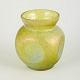 Loetz iridescent glass vase.Compact vase in mouth-blown glass with a richly iridescent surface ...