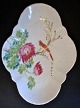 Chinese porcelain bowl, 19th century. Hand-painted with flowers and birds. 8-sided. L.: 27.5 cm. ...