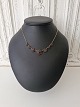 Vintage garnet necklace made of gold-plated metal. Length 44.5 cm. Diameter of the rosettes ...