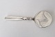 Lotus serving spade in silver and steel Stamped with the three towersLength 20 cm.
