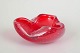 Murano, bowl.Organically shaped glass bowl in vivid red glass with controlled air bubbles and ...