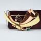 Viggo Wollny; A brooch in 14k gold and rose gold set ...