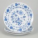 Meissen Blue Onion, set of three dinner plates.Three porcelain dinner plates with hand-painted ...