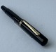 Black Miller No. 635 fountain pen. Push button filler.A new rubber sack must be inserted ...