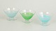 Kosta Boda, set of three cocktail glasses/dessert bowls.Elegant stemmed glass pieces in clear ...