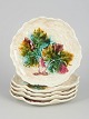 Gustavsberg majolica plates, set of five.Decorative faience plates with relief and ...
