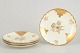 Rosenthal "Elfenbein" series, set of four gold decorated plates.Elegant porcelain plates with ...
