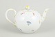 Meissen, teapot with polychrome flower decoration.Porcelain teapot hand painted with ...