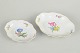 Meissen, set of two dishes with polychrome flower decoration.Set of two porcelain dishes hand ...