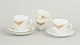Bjørn Wiinblad for Rosenthal, set of four coffee cups with matching saucers.Set consisting of ...