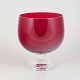 Reijmyre, large footed glass.Mouth-blown glass in clear and red tones with a rounded bowl and ...