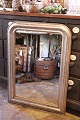 French 19th century Louis Philippe silver fireplace mirror with fine decorated frame. H:87cm. W:63cm.