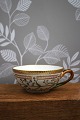 Large teacup (without saucer) in Flora Danica set produced by Royal Copenhagen...