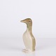 Ceramic penguin figure made in glazed stoneware from the 1960s. The figure has a simple ...