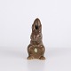 Hare figure by Knud Basse made in brown glazed ceramic. The model shows an upright seated hare ...