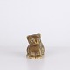 Cat figure by Knud Basse made in brown glazed ceramic. The model shows a seated cat with ...