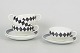 Karin Björquist for Gustavsberg, set of four teacups with matching saucers “Svart Ruter”.Set ...