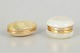 Italian alabaster, boxes from the 1940s.Two oval boxes in alabaster with integrated brass ...