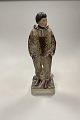 Royal Copenhagen Overglaze Figurine of Greenlandic Man No. 12225.Measures 32cm / 12 3/5 ...