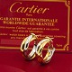 Cartier; Pair of medium Trinity earrings in 18k gold